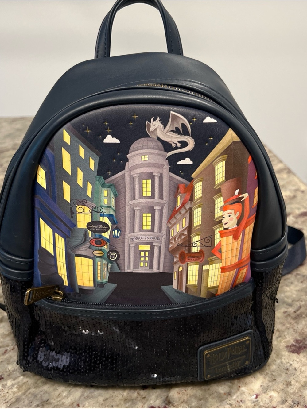Black Mini Loungefly
Backpack with Diagon Alley Illustration